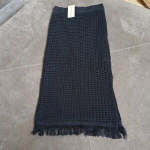 Black Knit Fringe Midi Skirt — Sleek Open-Weave Design